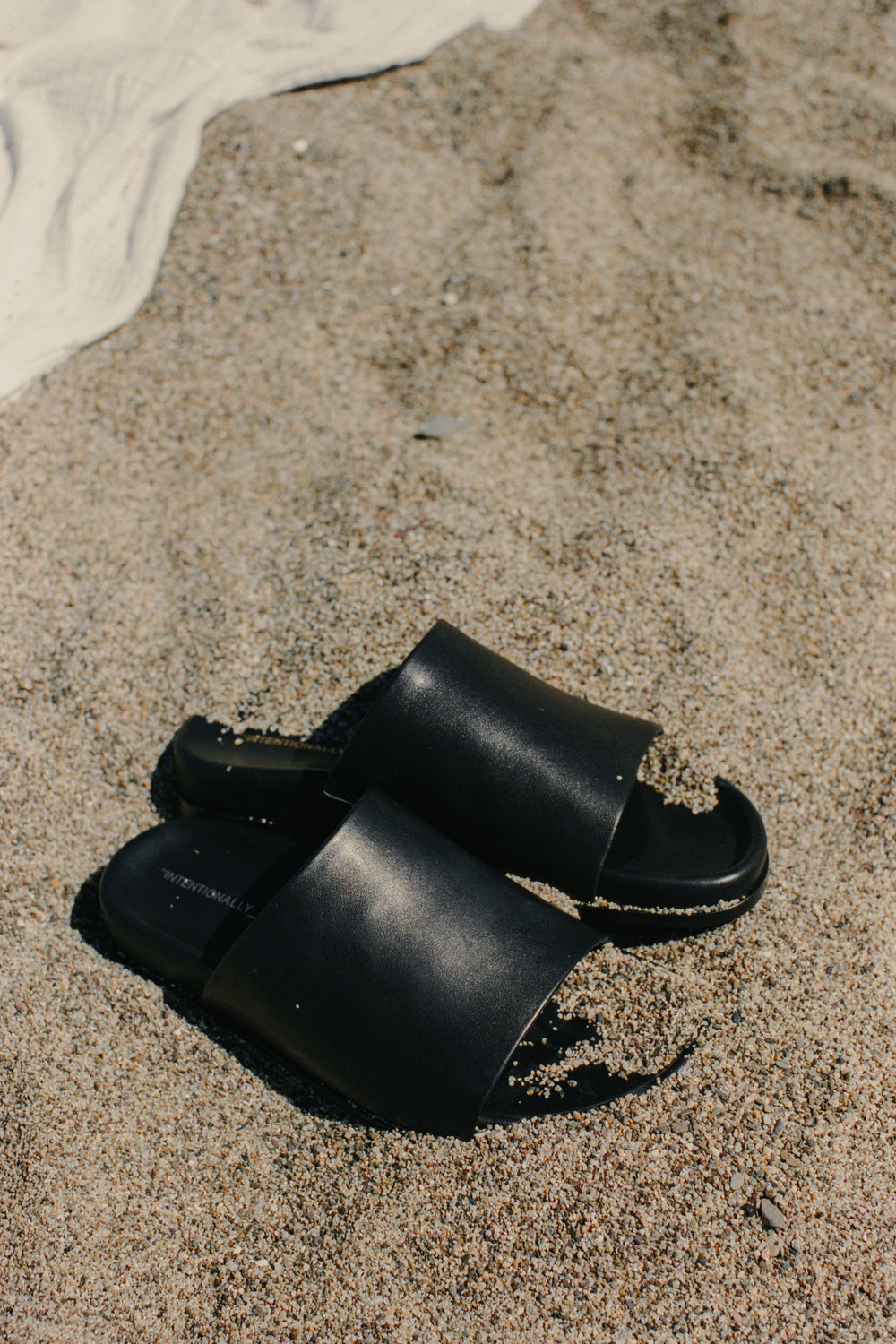 Intentionally Blank Pippy Slide in Black · Whimsy & Row